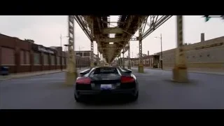 black sports car driving under bridge — Batman: The Dark Knight