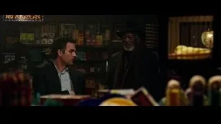 Two men conversing in a store — Now You See Me 2