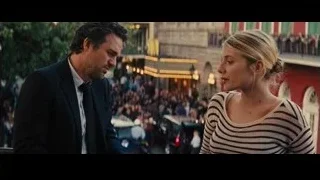 man and woman talking on street — Now You See Me