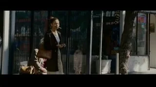 Young woman with cigarette on sidewalk — The Persuit of Happyness