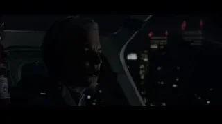 Man in helicopter cockpit viewing city at night — The Amazing Spider Man