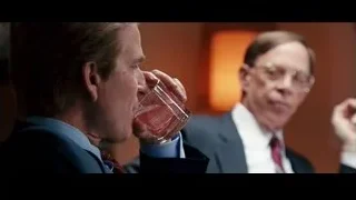 two men conversing in orange room — Jobs