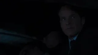 Bald man in suit holding walkie-talkie — The Avengers