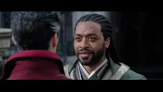 man with dreadlocks in green and gold outfit — Doctor Strange 2