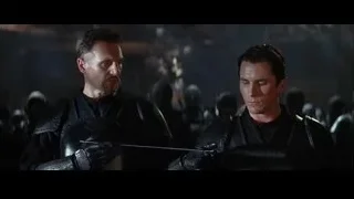 two armored men with sword in dark room — Batman