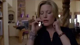 woman talking on phone in living room — Breaking Bad