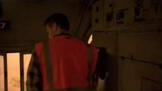 Man in orange vest in old train car — Breaking Bad