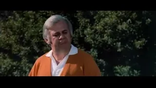 elderly man in orange cardigan outdoors — Bruce Lee: Enter The Dragon