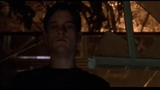 Young man in black t-shirt in dim room — Spider Man