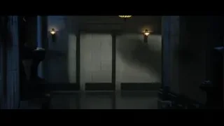 Empty dimly lit hallway with two large doors — Doctor Strange 2