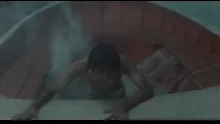 Man sitting in bathtub in distress — Life of Pi