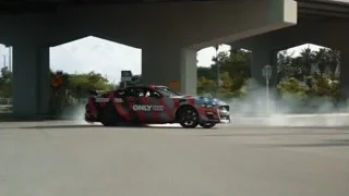 red and white sports car drifting on track — Sports Cars