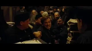 Men laughing around table with book — Harry Potter and the Goblet of Fire