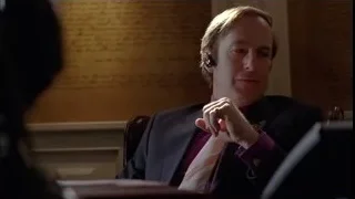 man in suit with pink tie at desk — Breaking Bad