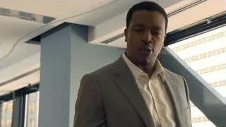 Man in suit standing in office — Suits