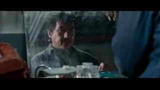 man deep in thought at table — The Karate Kid